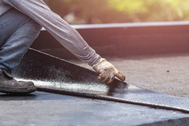 Professional Waterproofing technician working in Bayou La Batre, AL